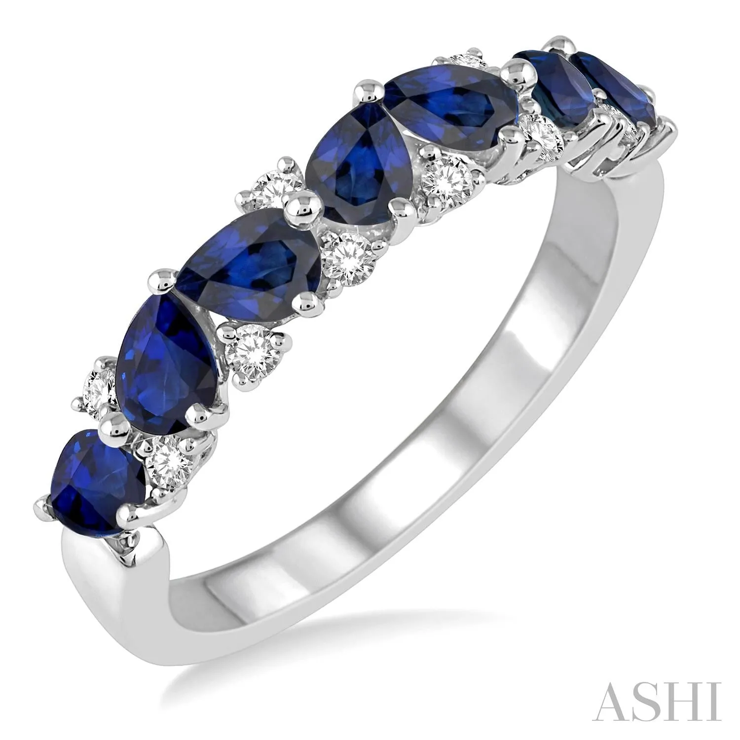 14KW 0.15 CTW  Pear Shape Sapphire and Round Cut Diamond Ring