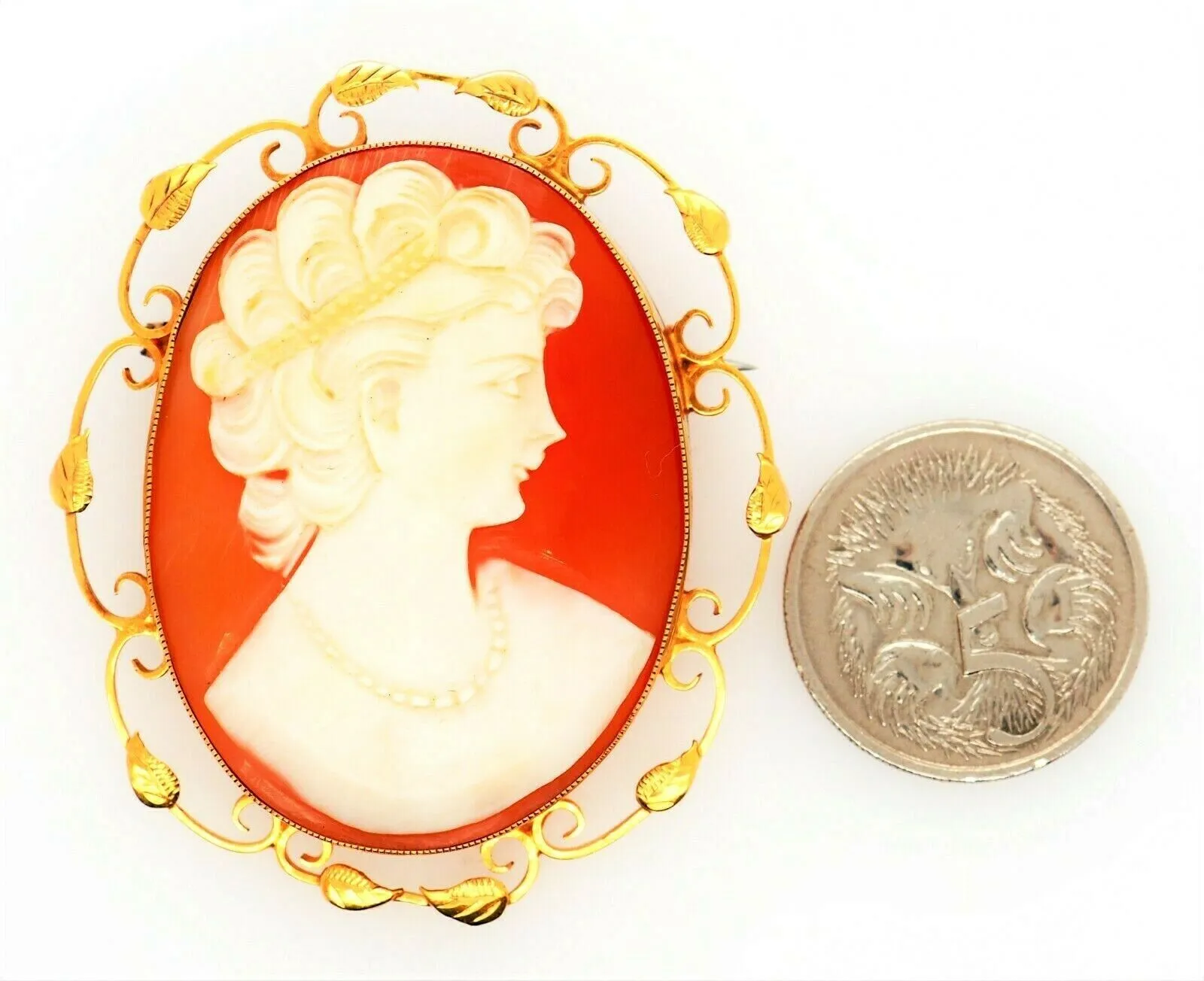 9ct Yellow Gold Shell Cameo Brooch with Scroll Wire & Leaf Surround