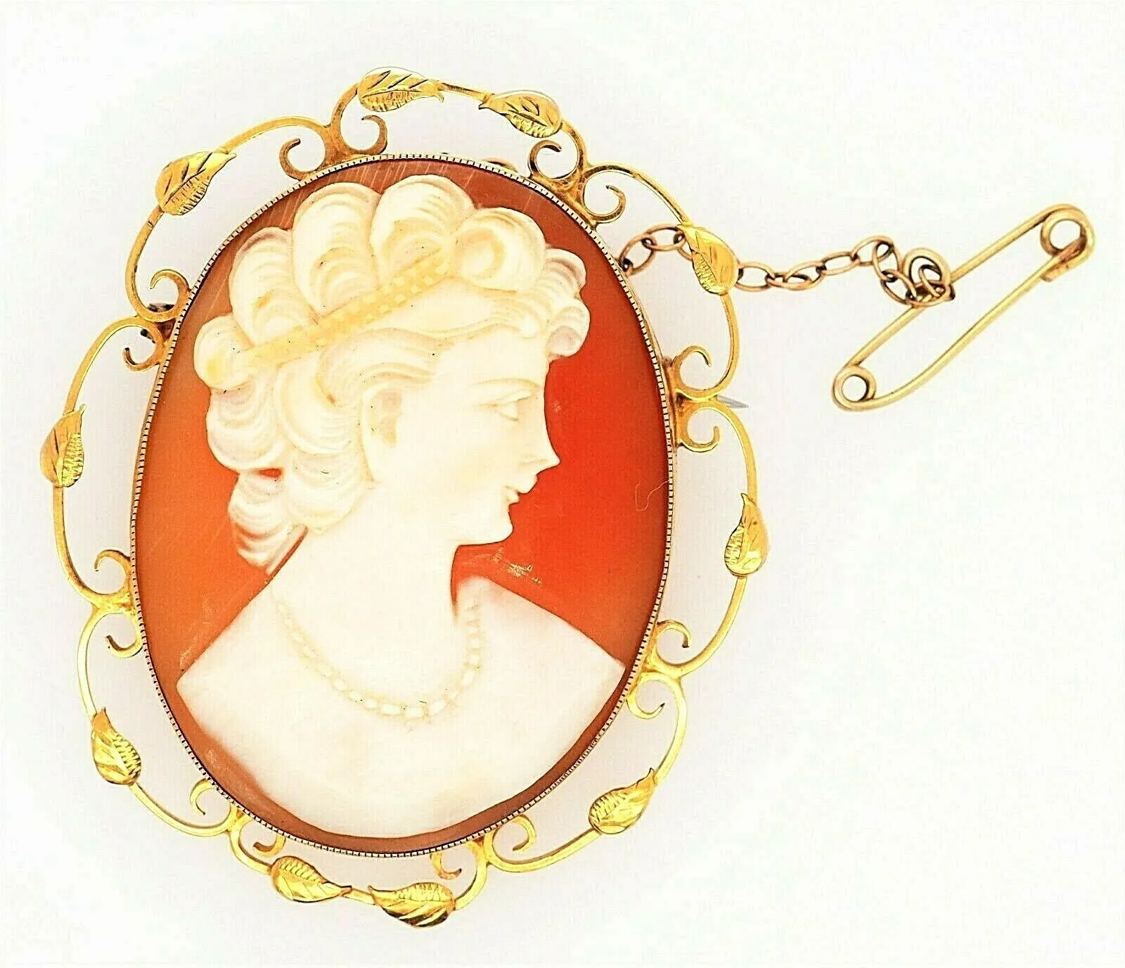 9ct Yellow Gold Shell Cameo Brooch with Scroll Wire & Leaf Surround