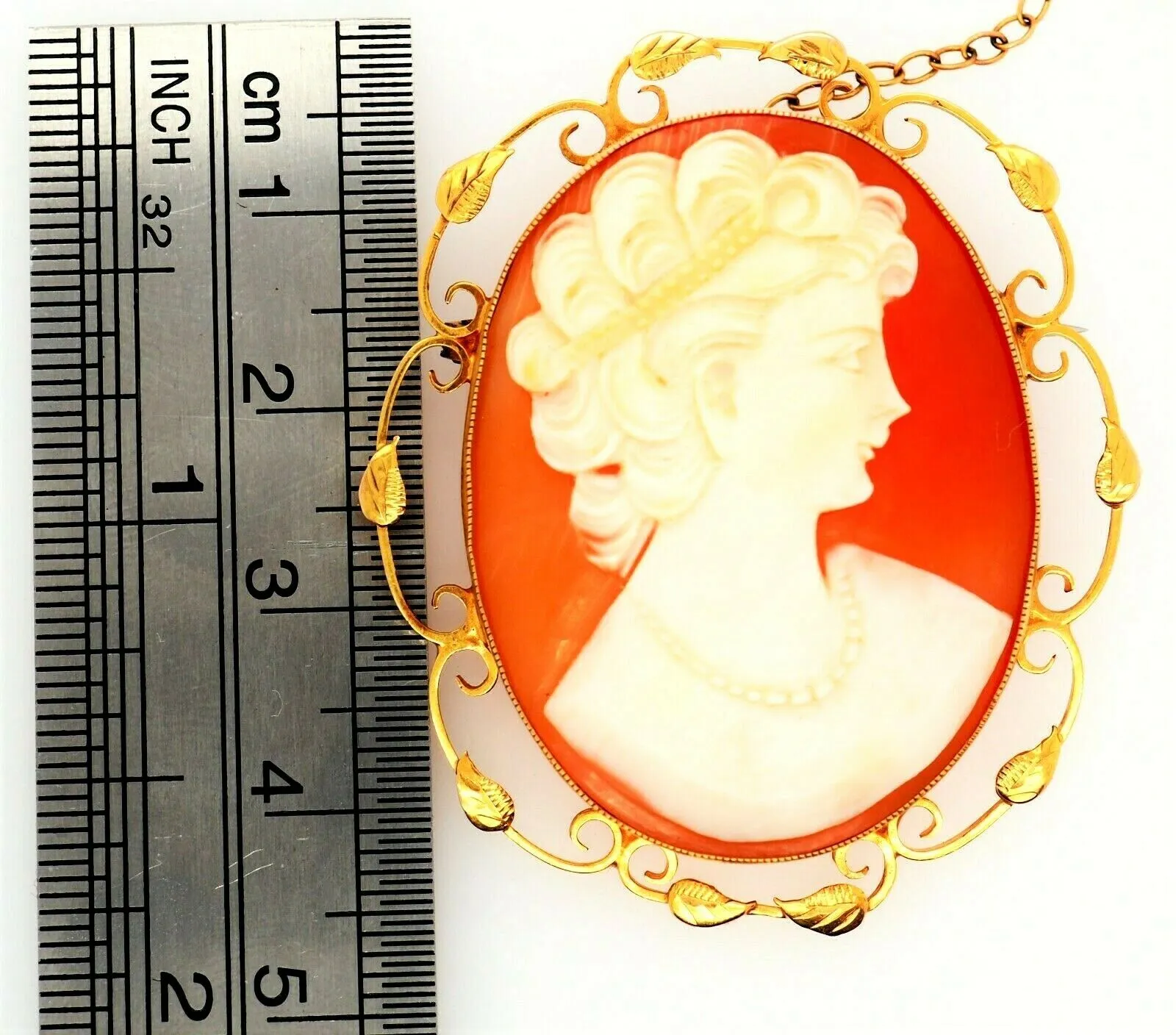 9ct Yellow Gold Shell Cameo Brooch with Scroll Wire & Leaf Surround