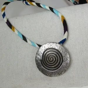 Big Silver Pendant on Multi-colored Leather Necklace