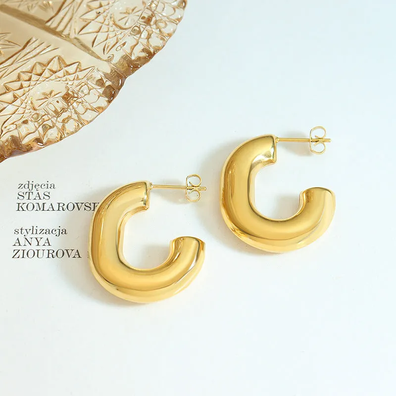 European Chic Hollow U-shaped Earrings - Stylish Metal Jewelry for Women